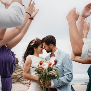 hermosa-pareja-celebrando-su-boda-playa_23-2149003503